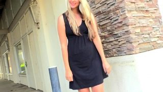 Outdoor solo masturbation scene with curly blonde